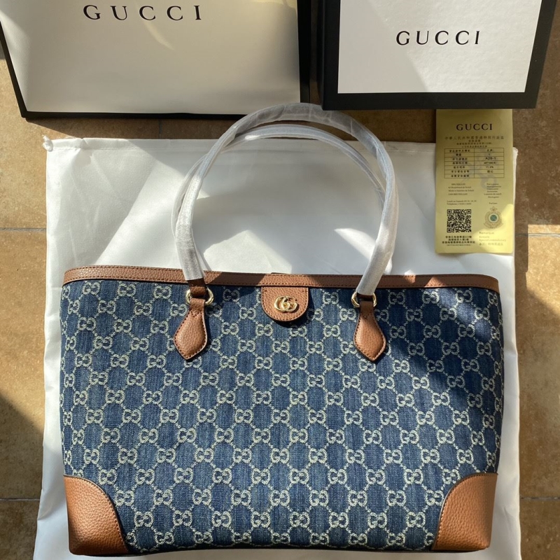 G*u*i shopping bags